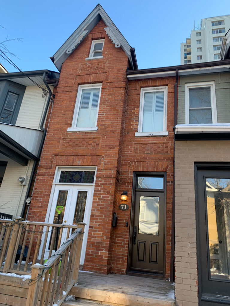 Victorian brick facade restoration project in Toronto showing deteriorated brickwork